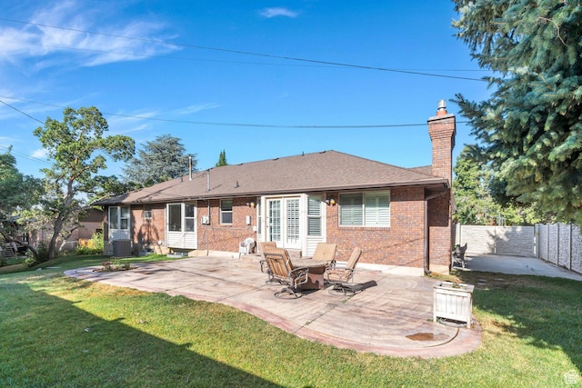 421 S 1400 E, Fruit Heights, UT 84037 - back of house with brick siding, a chimney, and a patio area