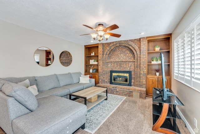 421 S 1400 E, Fruit Heights, UT 84037 - living area with a ceiling fan, built in features, a brick fireplace, and carpet