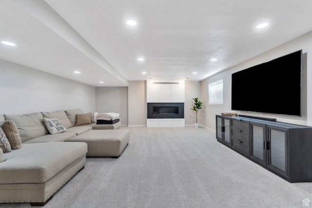 421 S 1400 E, Fruit Heights, UT 84037 - living room with recessed lighting, light carpet, and a glass covered fireplace