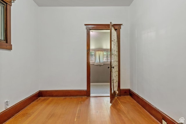 168 N T St E, Salt Lake City, UT 84103 - unfurnished room with light wood finished floors and baseboards
