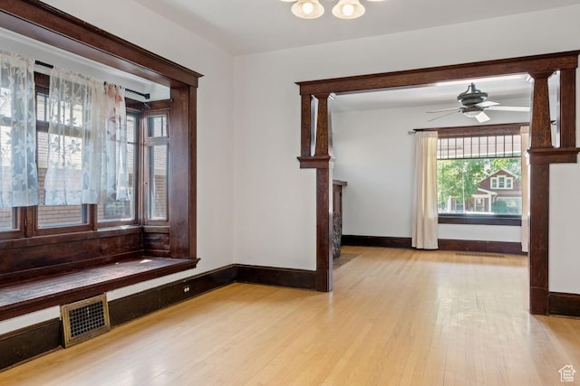 168 N T St E, Salt Lake City, UT 84103 - empty room with wood finished floors and ceiling fan