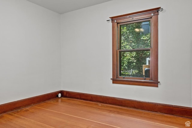 168 N T St E, Salt Lake City, UT 84103 - empty room featuring wood finished floors and baseboards