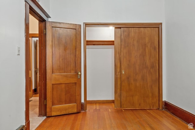 168 N T St E, Salt Lake City, UT 84103 - unfurnished bedroom featuring hardwood / wood-style floors
