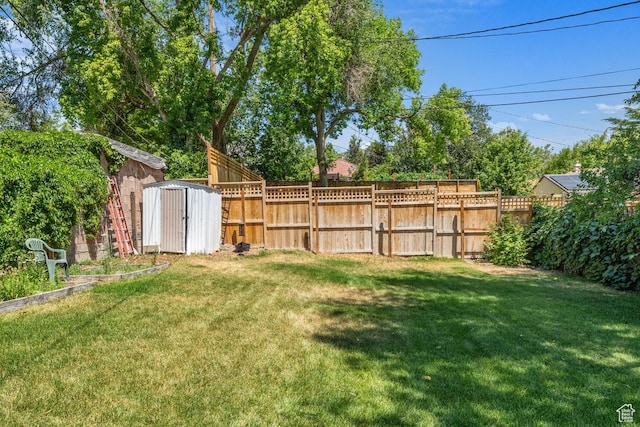 168 N T St E, Salt Lake City, UT 84103 - view of yard featuring a storage shed