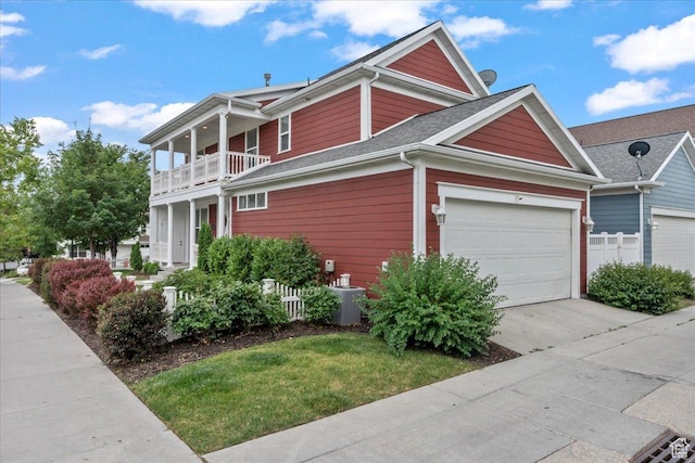 4988 W Currant Dr, South Jordan, UT 84009 - view of property exterior featuring a garage, concrete driveway, a balcony, and a shingled roof