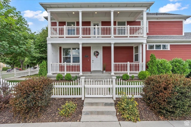 4988 W Currant Dr, South Jordan, UT 84009 - view of front of home featuring a balcony and covered porch