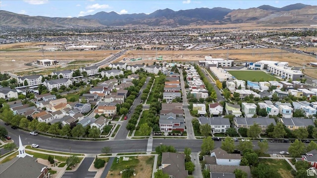 4988 W Currant Dr, South Jordan, UT 84009 - aerial view of property and surrounding area featuring a mountain backdrop and nearby suburban area