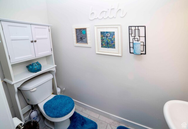 6122 W Lake Ave S, South Jordan, UT 84009 - bathroom with tile patterned floors and baseboards