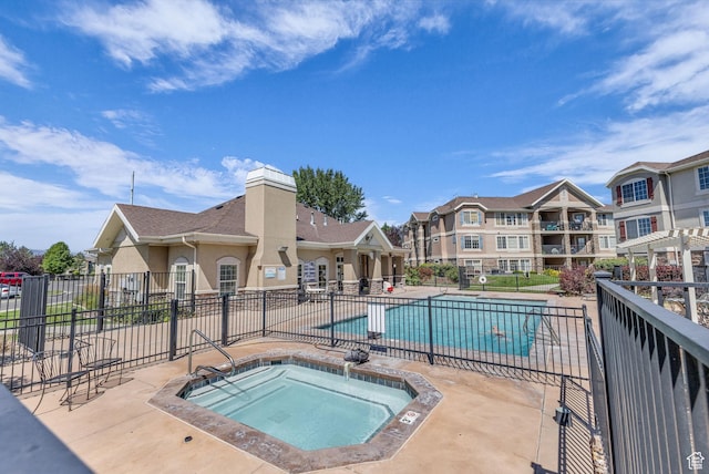 1195 W Dallin Dr Unit 304, Pleasant Grove, UT 84062 - community pool featuring a hot tub and a patio area