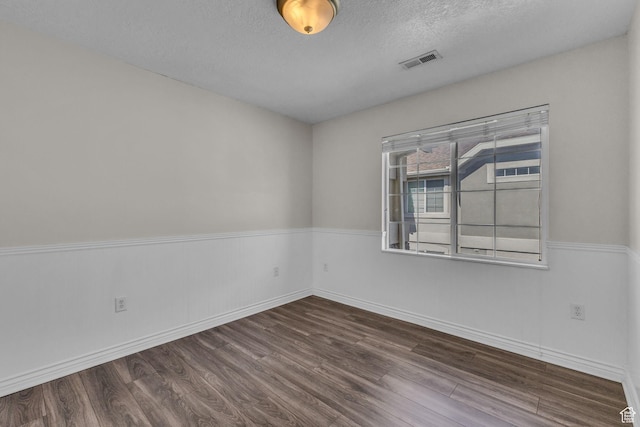 1195 W Dallin Dr Unit 304, Pleasant Grove, UT 84062 - empty room with wood finished floors and a textured ceiling