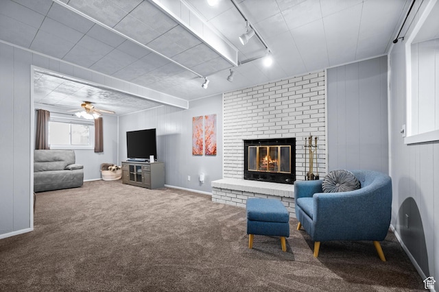 1609 E Sego Lily Dr, Sandy, UT 84092 - carpeted living room featuring a fireplace, track lighting, and ceiling fan