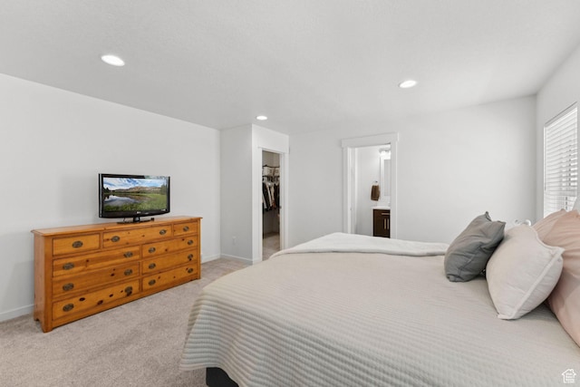 4915 N Marble Fox Way Unit 126, Lehi, UT 84043 - bedroom featuring light carpet, recessed lighting, a spacious closet, ensuite bathroom, and a closet
