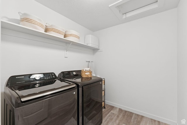 4915 N Marble Fox Way Unit 126, Lehi, UT 84043 - laundry area with attic access, washing machine and clothes dryer, and light wood-type flooring