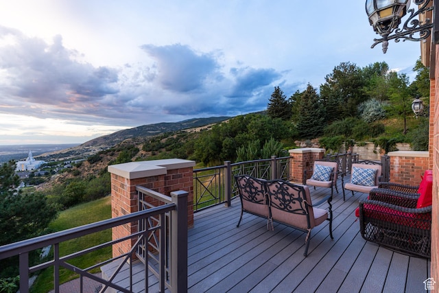 1781 Lorien Dr, Bountiful, UT 84010 - deck at dusk with a mountain view