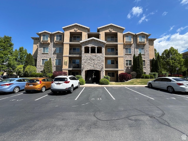 982 W 960 N Unit 101, Orem, UT 84057 - view of building exterior featuring uncovered parking