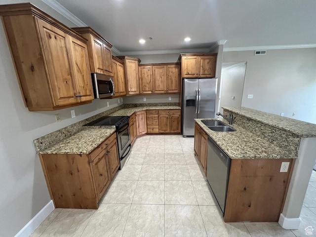 982 W 960 N Unit 101, Orem, UT 84057 - kitchen with appliances with stainless steel finishes, ornamental molding, brown cabinetry, a center island with sink, and stone counters
