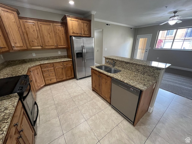 982 W 960 N Unit 101, Orem, UT 84057 - kitchen with stainless steel appliances, brown cabinets, a ceiling fan, dark stone counters, and an island with sink