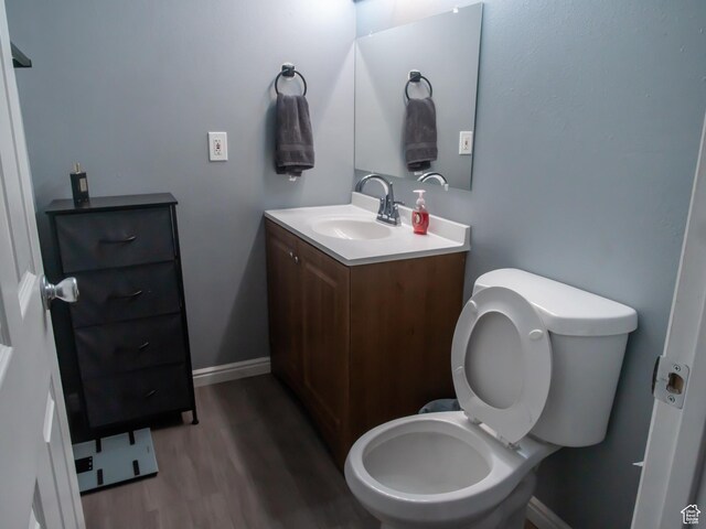 663 N 550 W, Orem, UT 84057 - half bathroom featuring vanity and wood finished floors