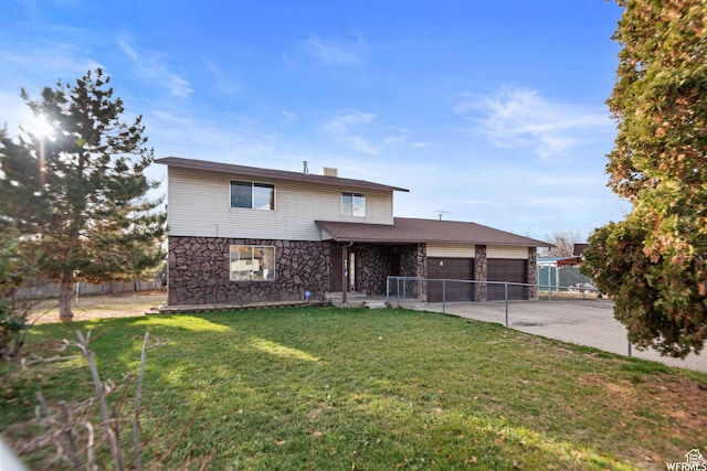 663 N 550 W, Orem, UT 84057 - view of front of home with stone siding, a garage, and driveway