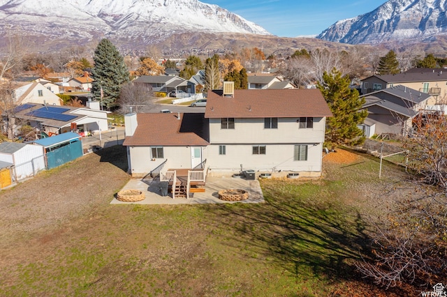 663 N 550 W, Orem, UT 84057 - aerial view of residential area with a mountainous background