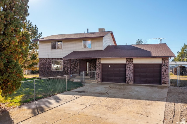663 N 550 W, Orem, UT 84057 - traditional-style home featuring an attached garage, stone siding, and concrete driveway
