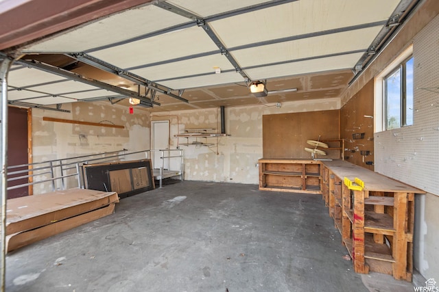 663 N 550 W, Orem, UT 84057 - garage featuring a workshop area and a garage door opener