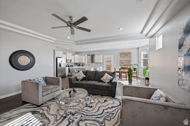 974 N Pleasant Valley Ln, Washington, UT 84780 - living area featuring wood finished floors, a ceiling fan, a tray ceiling, and recessed lighting