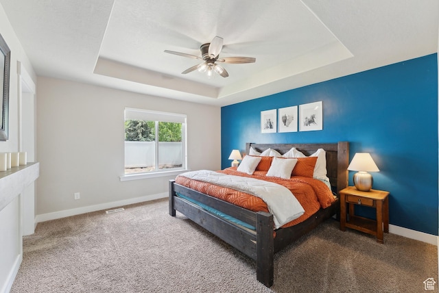 631 S Falkirk Rd, Heber City, UT 84032 - carpeted bedroom featuring a tray ceiling and ceiling fan