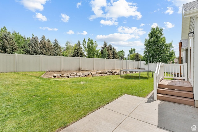 631 S Falkirk Rd, Heber City, UT 84032 - fenced backyard featuring a patio and a trampoline
