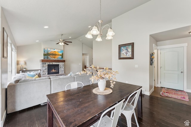 631 S Falkirk Rd, Heber City, UT 84032 - dining room featuring dark wood-type flooring, a ceiling fan, a fireplace, lofted ceiling, and a chandelier