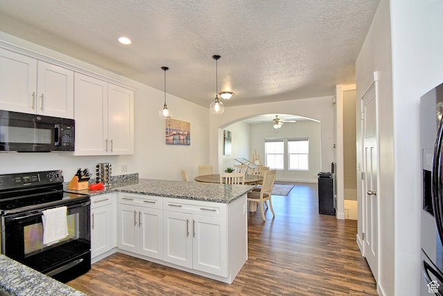685 E 355 N, Vineyard, UT 84059 - kitchen featuring black appliances, arched walkways, a peninsula, dark wood finished floors, and white cabinetry