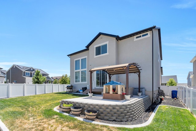131 N Desert Sage Dr, Saratoga Springs, UT 84045 - back of house with a fenced backyard, a pergola, stucco siding, a patio area, and an outdoor hangout area