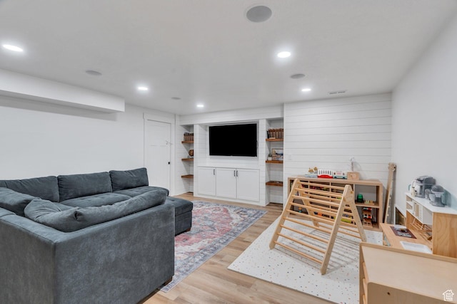 131 N Desert Sage Dr, Saratoga Springs, UT 84045 - living room featuring light wood-type flooring and recessed lighting