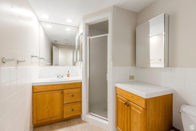 2722 E Eagle Way, Salt Lake City, UT 84108 - bathroom featuring tile walls, a stall shower, vanity, recessed lighting, and decorative backsplash