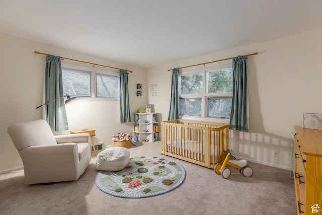 2722 E Eagle Way, Salt Lake City, UT 84108 - carpeted bedroom featuring multiple windows and a nursery area