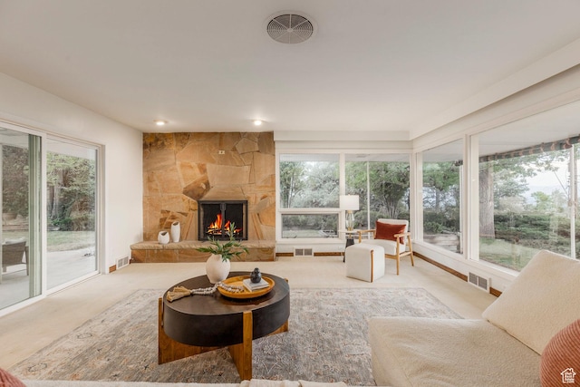2722 E Eagle Way, Salt Lake City, UT 84108 - living room with healthy amount of natural light, a fireplace, and carpet flooring