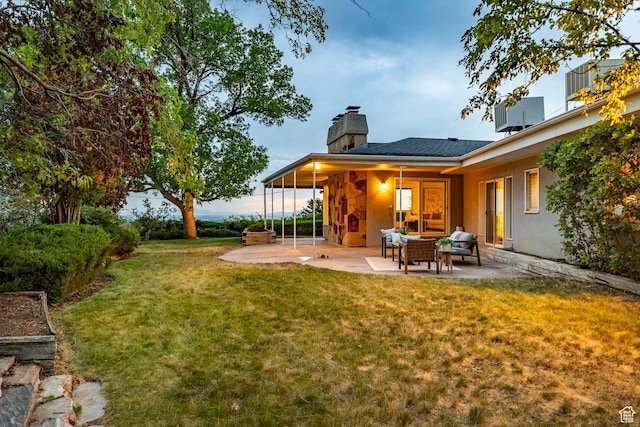 2722 E Eagle Way, Salt Lake City, UT 84108 - view of green lawn featuring a patio