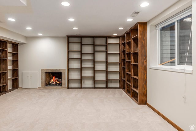 2722 E Eagle Way, Salt Lake City, UT 84108 - basement with recessed lighting, light colored carpet, and a fireplace