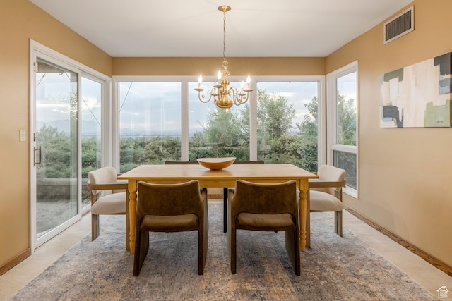 2722 E Eagle Way, Salt Lake City, UT 84108 - dining space with baseboards and a chandelier
