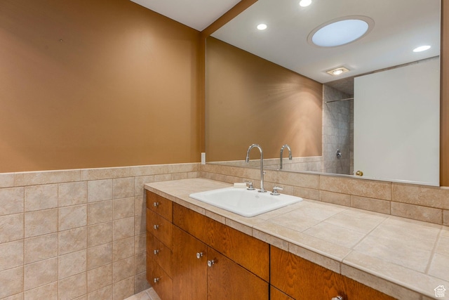2722 E Eagle Way, Salt Lake City, UT 84108 - bathroom featuring vanity, recessed lighting, tile walls, and wainscoting