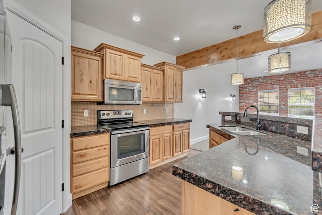 10925 N Marsala Dr, Highland, UT 84003 - kitchen with stainless steel appliances, light brown cabinets, backsplash, dark wood-style flooring, and pendant lighting