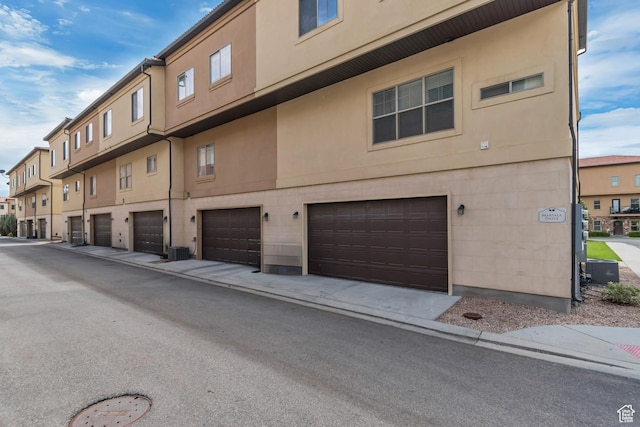 10925 N Marsala Dr, Highland, UT 84003 - view of building exterior with an attached garage