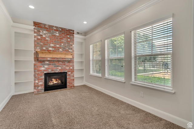 10925 N Marsala Dr, Highland, UT 84003 - unfurnished living room with a brick fireplace, carpet floors, built in features, recessed lighting, and crown molding