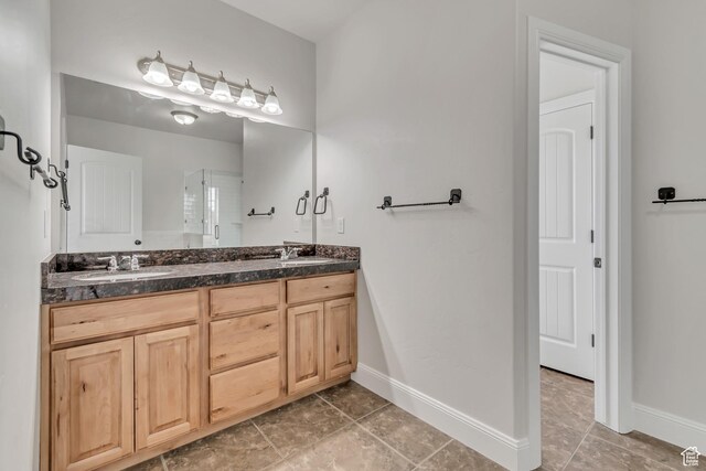 10925 N Marsala Dr, Highland, UT 84003 - bathroom with double vanity, a shower, and tile patterned flooring