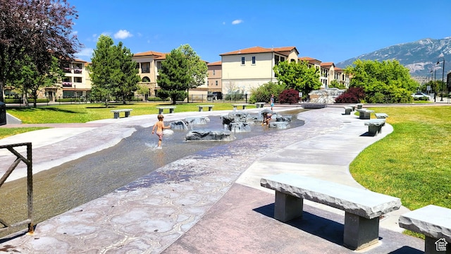 10925 N Marsala Dr, Highland, UT 84003 - view of community with a yard, a mountain view, and a residential view
