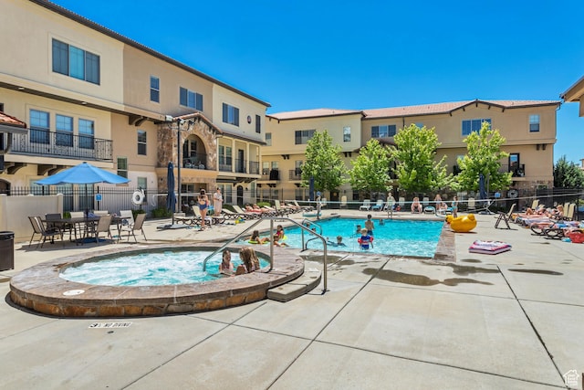10925 N Marsala Dr, Highland, UT 84003 - community pool with a hot tub and a patio area