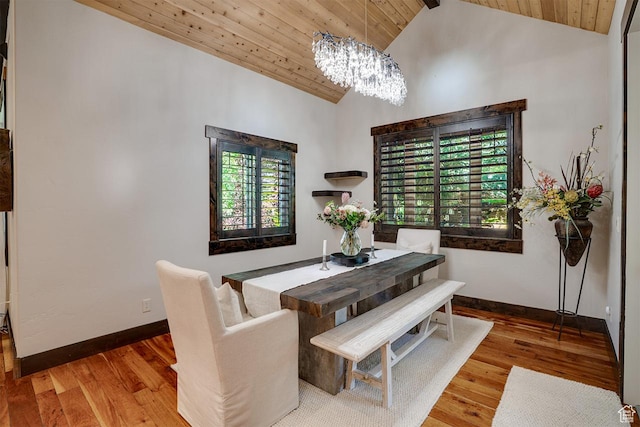 1307 N Dutch Highland Dr, Midway, UT 84049 - dining space with a chandelier, a wooden ceiling with exposed beams, wood finished floors, and high vaulted ceiling