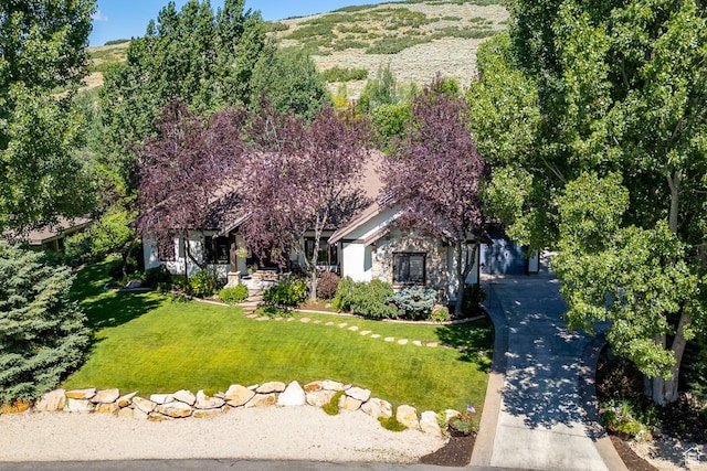 1307 N Dutch Highland Dr, Midway, UT 84049 - obstructed view of property featuring a front lawn
