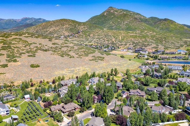 1307 N Dutch Highland Dr, Midway, UT 84049 - aerial view of property's location with a mountain backdrop and nearby suburban area