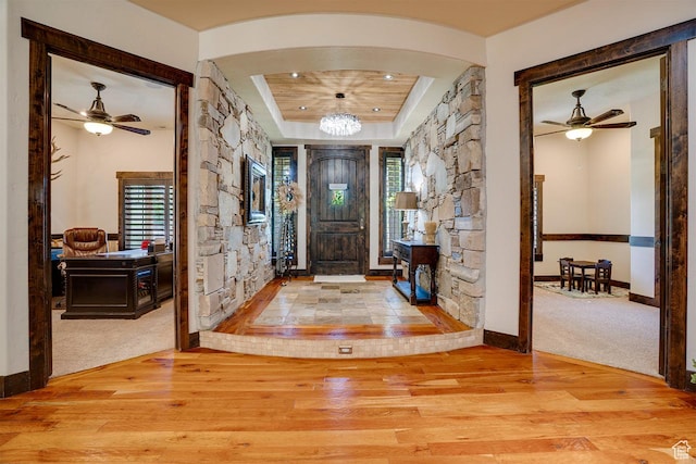 1307 N Dutch Highland Dr, Midway, UT 84049 - entryway with wood finished floors, ceiling fan, a tray ceiling, and carpet flooring